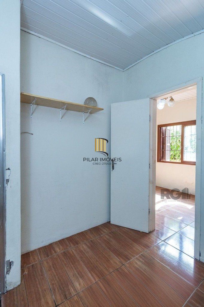 Casa de 4 dormitórios no bairro Camaquã