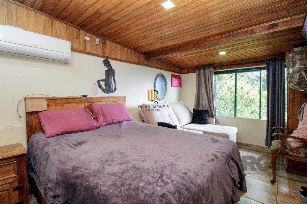 Casa 5 dormitórios no bairro Nonoai