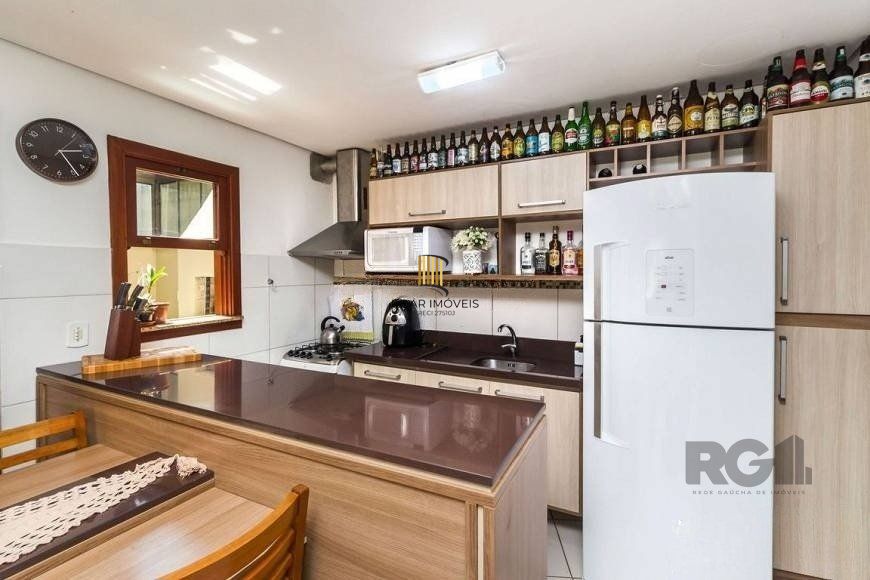 Casa em condomínio de 84m² - 2 dormitórios, 1 suíte e 1 vaga no bairro Ipanema