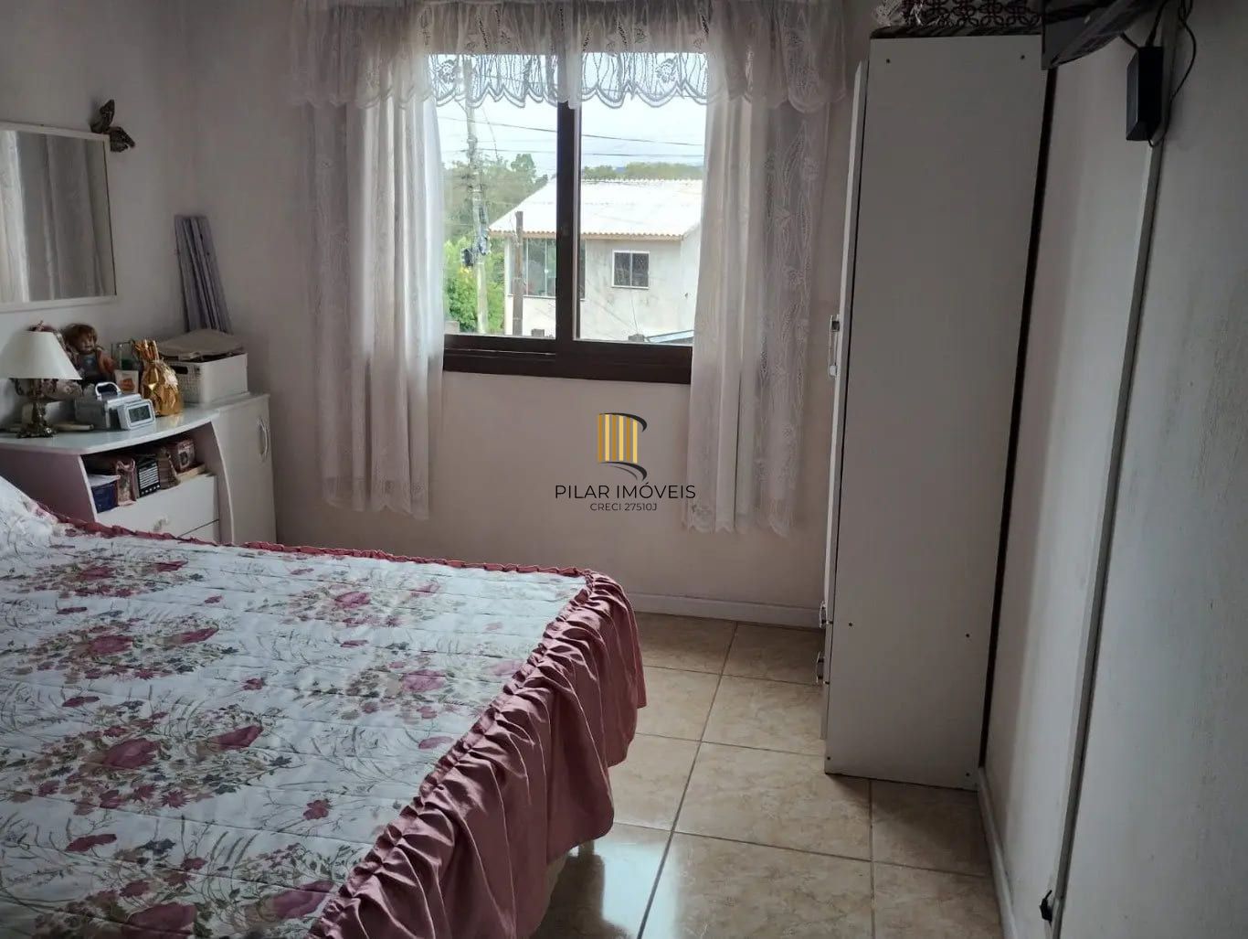 Casa de 3 dormitórios e 111m² à venda em Jardim Botânico, Porto Alegre.