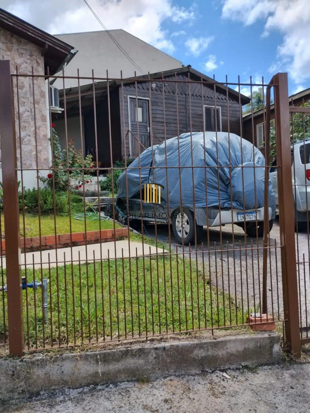 Casa de 3 dormitórios e 111m² à venda em Jardim Botânico, Porto Alegre.
