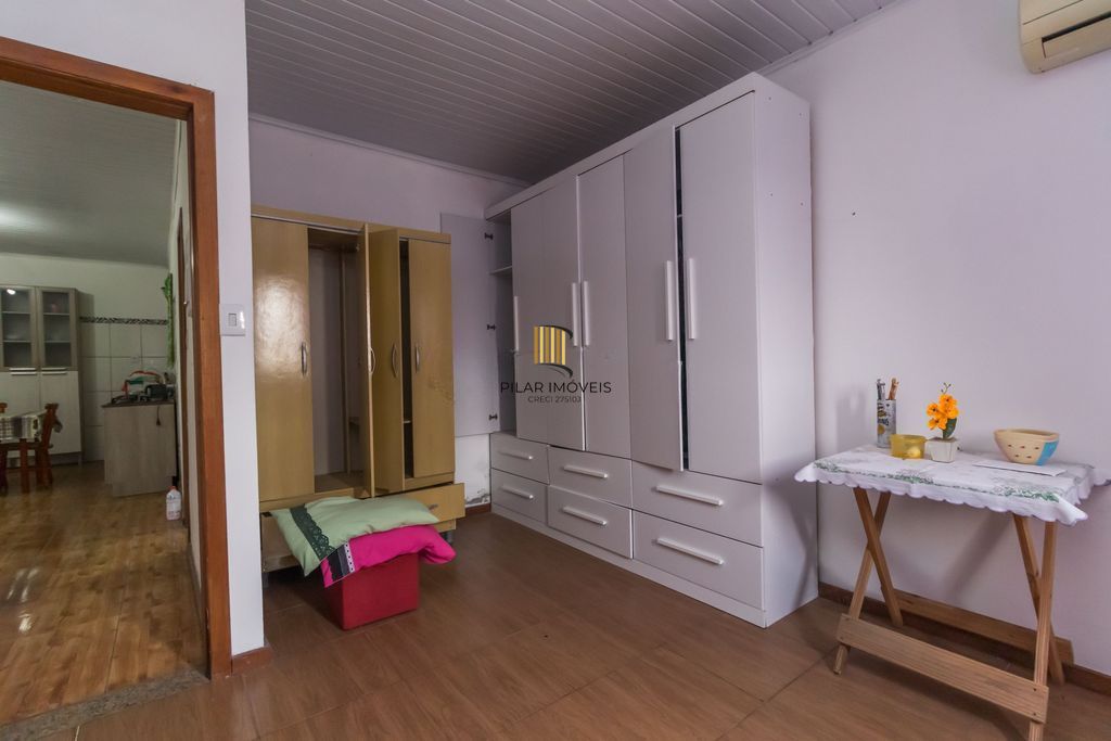 Casa de 6 dormitórios à venda Bairro Vila Nova - Porto Alegre