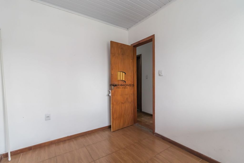 Casa de 6 dormitórios à venda Bairro Vila Nova - Porto Alegre