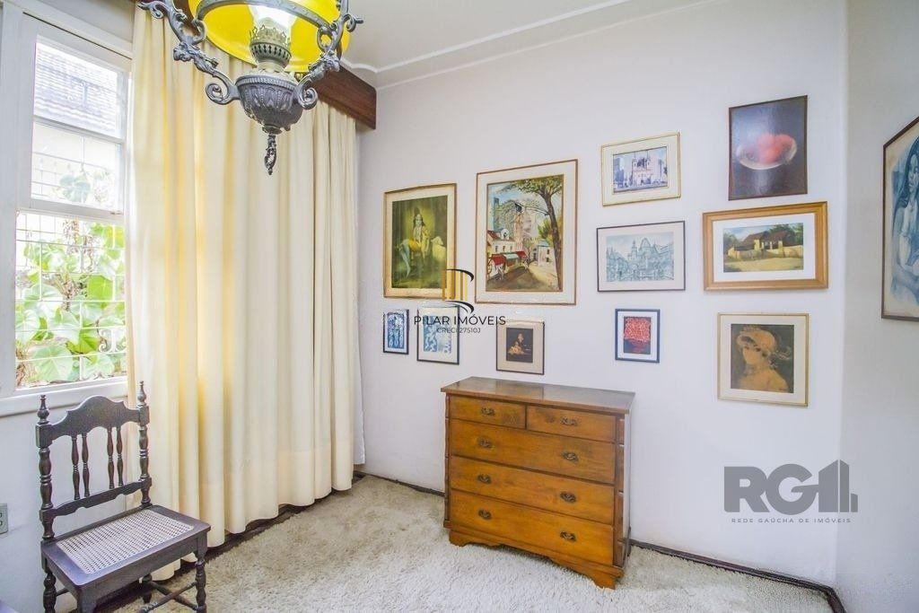 Casa de 4 dormitórios, bairro Santa Tereza