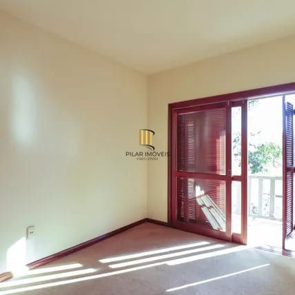 Casa à venda com 4 dormitorios no Bairro Nonoai - Porto Alegre