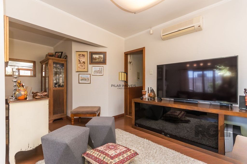 Casa de 3 dormitórios no bairro Chácara das Pedras