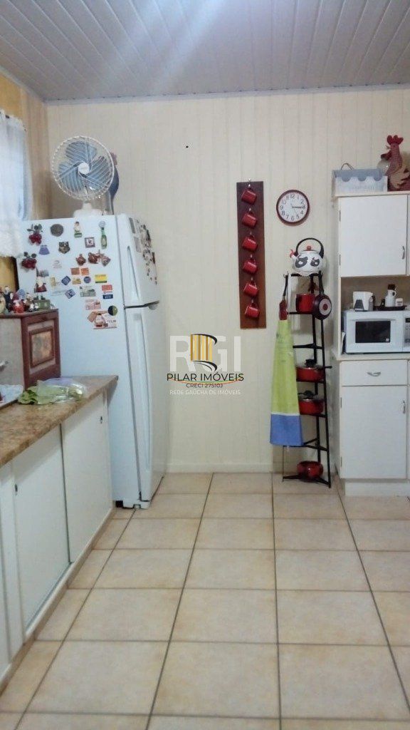 Casa 4 dormitórios no bairro Nonoai