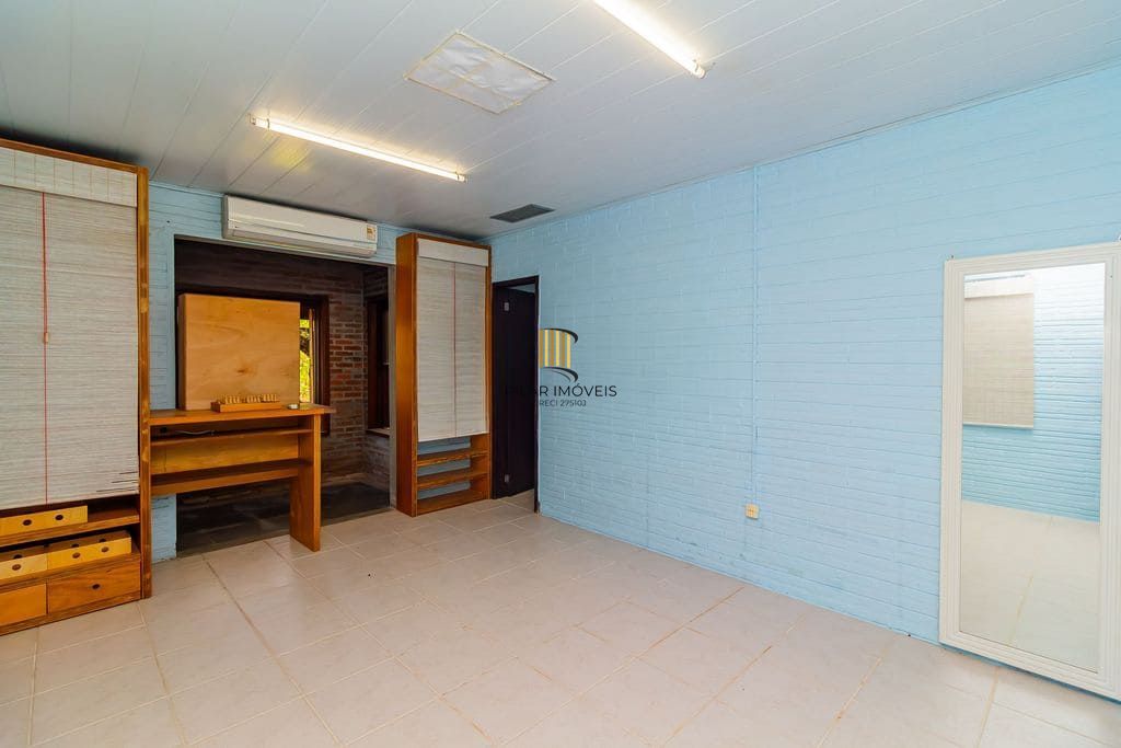 Casa de 3 dormitórios, no Bairro Ponta Grossa - Porto Alegre