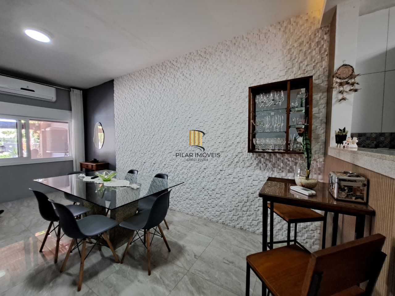 Casa com 04 dormitórios e piscina na praia de Imbé/ RS.