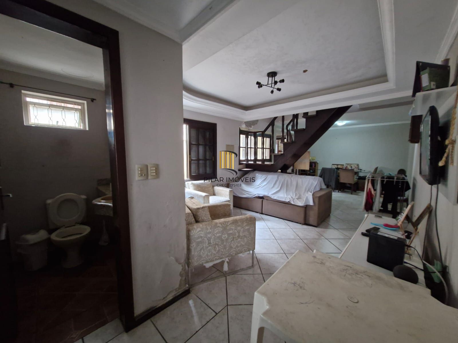 Casa de 3 dormitórios com piscina no bairro Teresópolis.