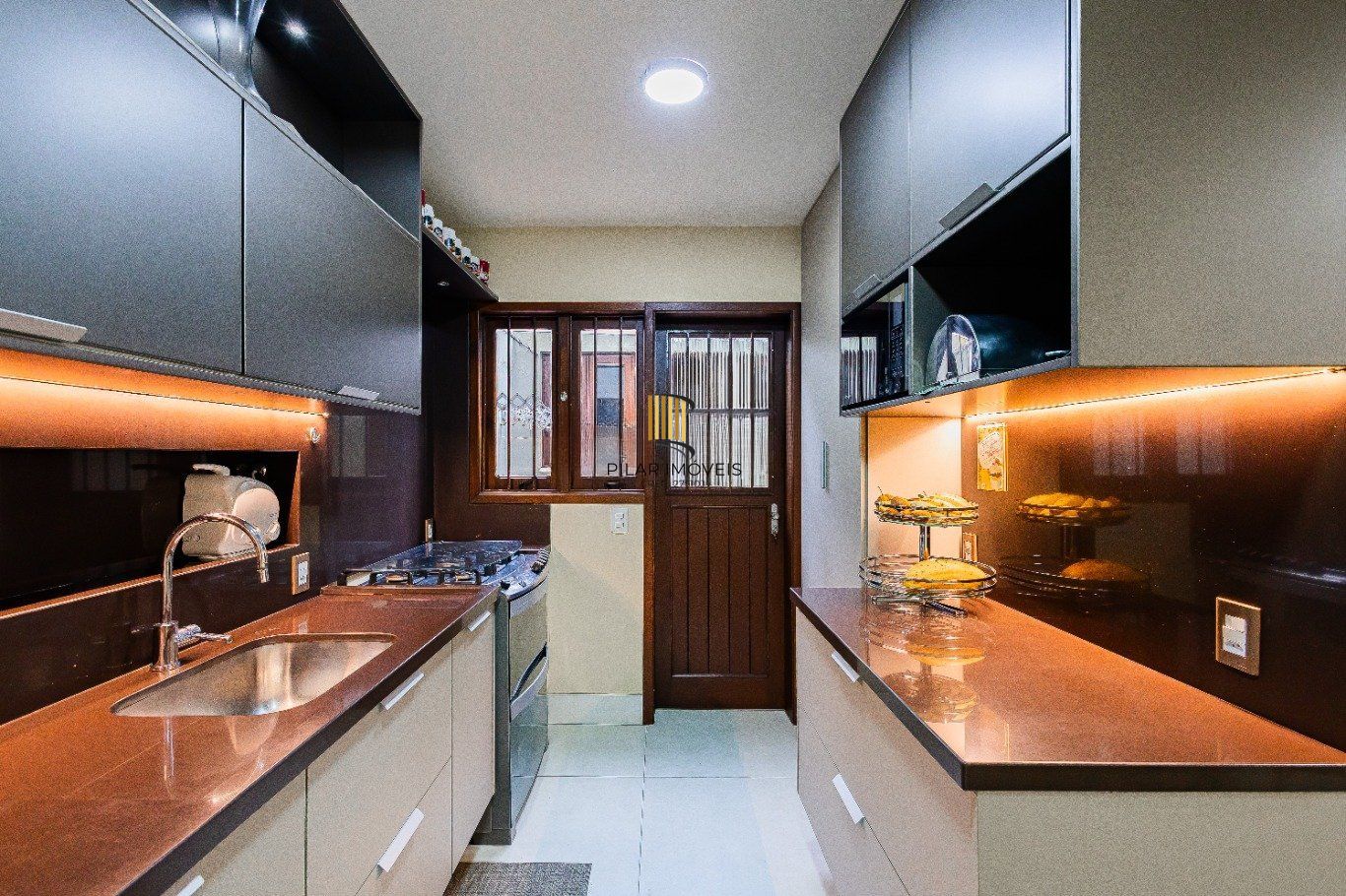 Casa de 4 dormitórios e 208m² à venda no Bairro Jardim Botânico, Porto Alegre.