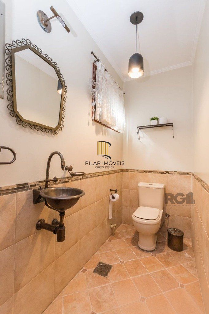 Casa de 3 dormitórios no bairro Chácara das Pedras
