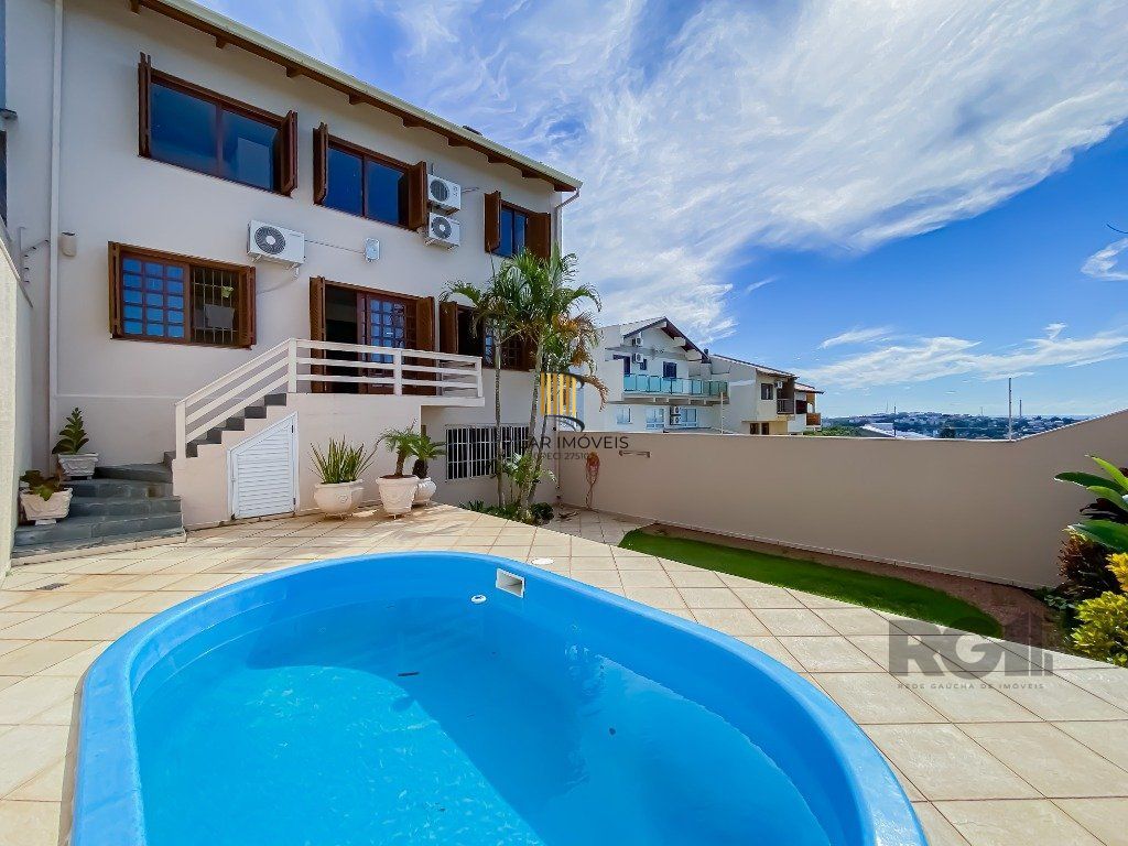 Casa alto padrão, 500m² privativos com linda vista da cidade no Morro Apamecor
