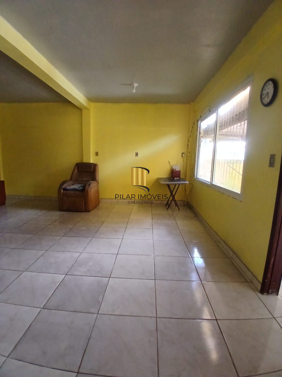 Ampla casa com patio no bairro Rubem Berta .