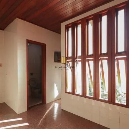 Casa à venda com 4 dormitorios no Bairro Nonoai - Porto Alegre