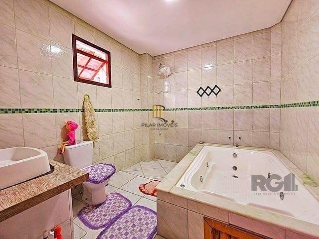 casa de 2 dormitorios, no bairro Mário Quintana