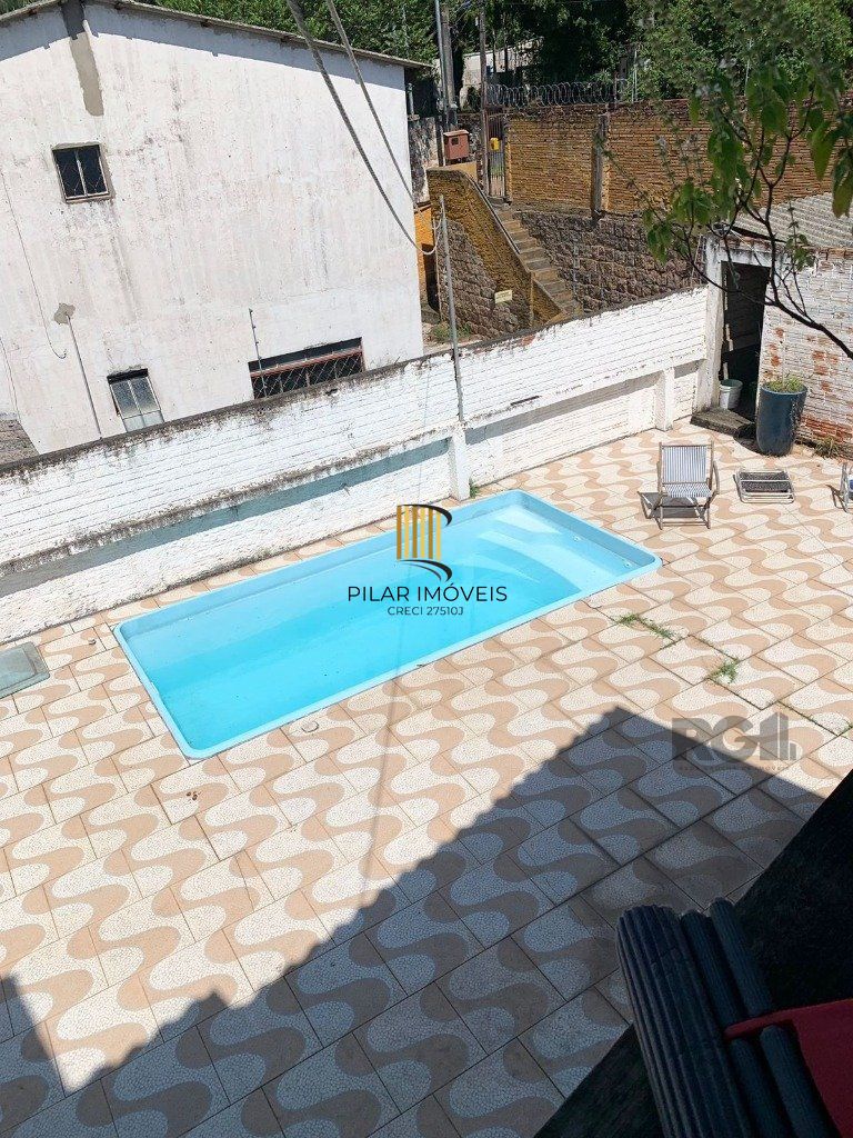 Casa 3 dormitórios no bairro Glória