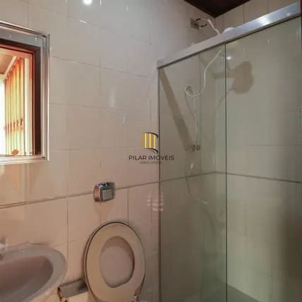 Casa à venda com 4 dormitorios no Bairro Nonoai - Porto Alegre