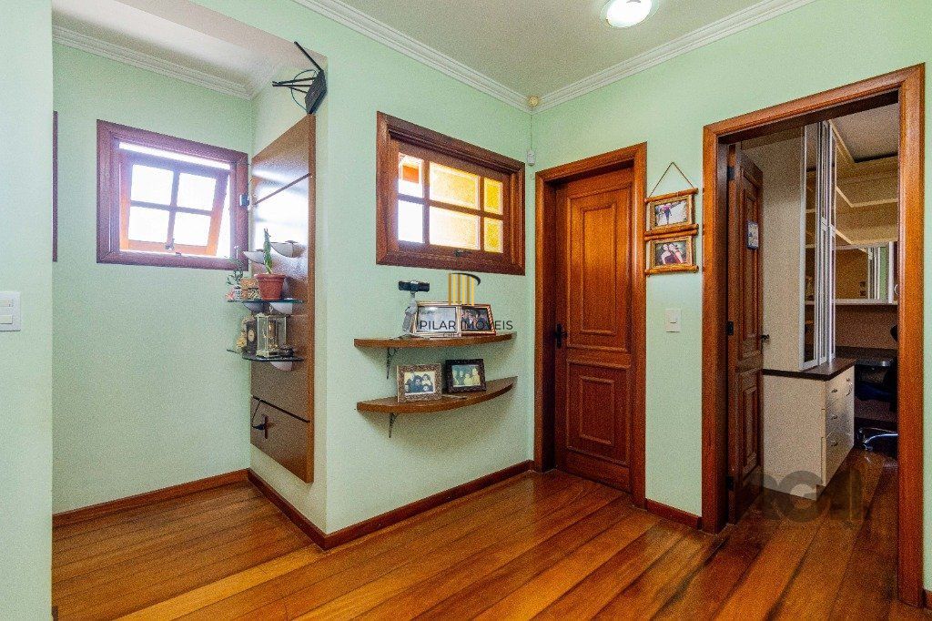Casa de 4 dormitórios 304m² no bairro Jardim Lindóia