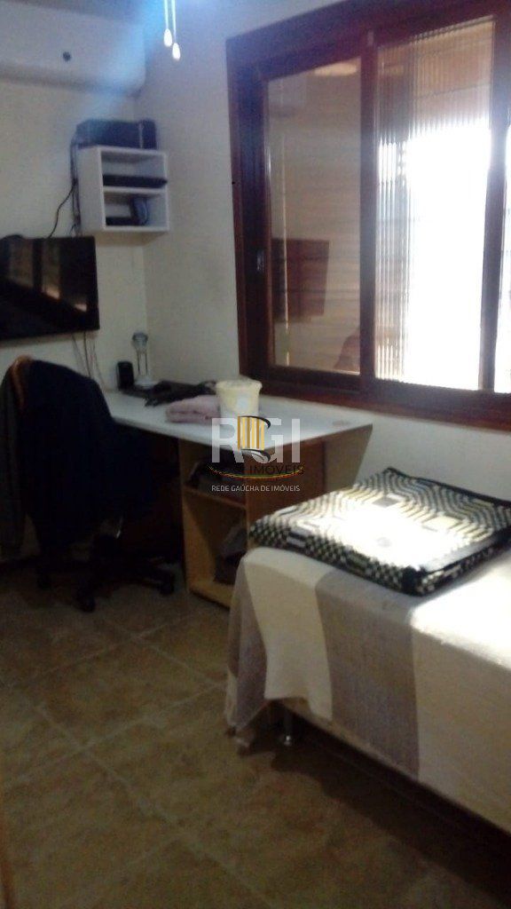 Casa 4 dormitórios no bairro Nonoai