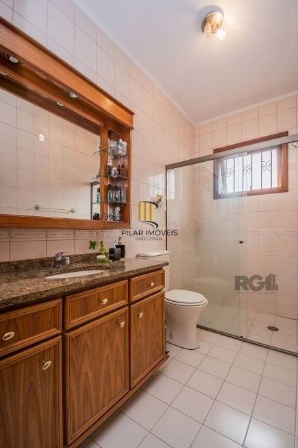 Casa 279m² - 4 dormitórios, 3 vagas no bairro Santa Tereza