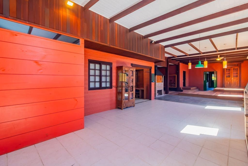 Casa de 3 dormitórios, no Bairro Ponta Grossa - Porto Alegre