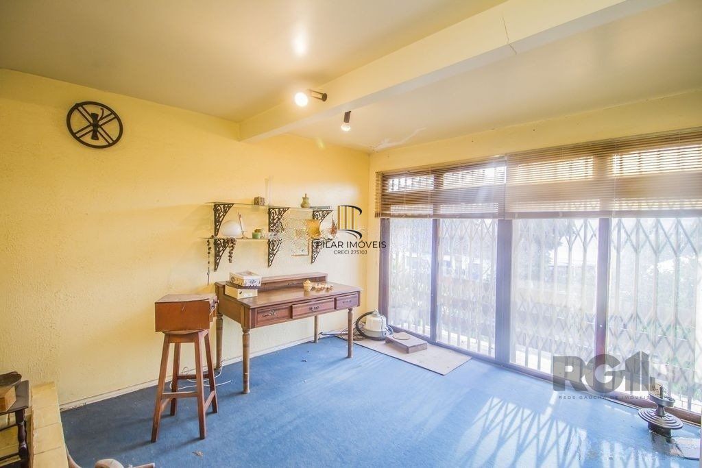 Casa de 4 dormitórios, bairro Santa Tereza