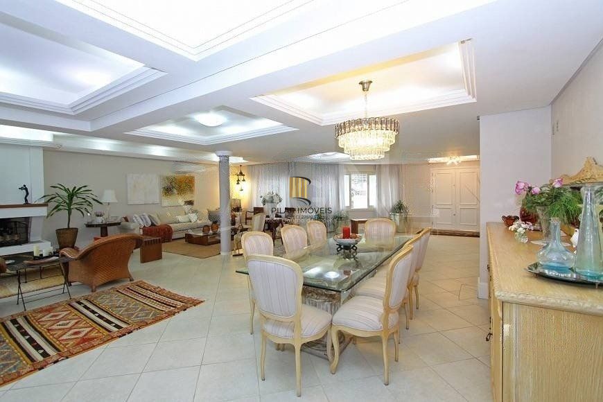EXCELENTE CASA COM 4 DORMITÓRIOS, 6 VAGAS DE GARAGEM E VISTA PANORÂMICA.
