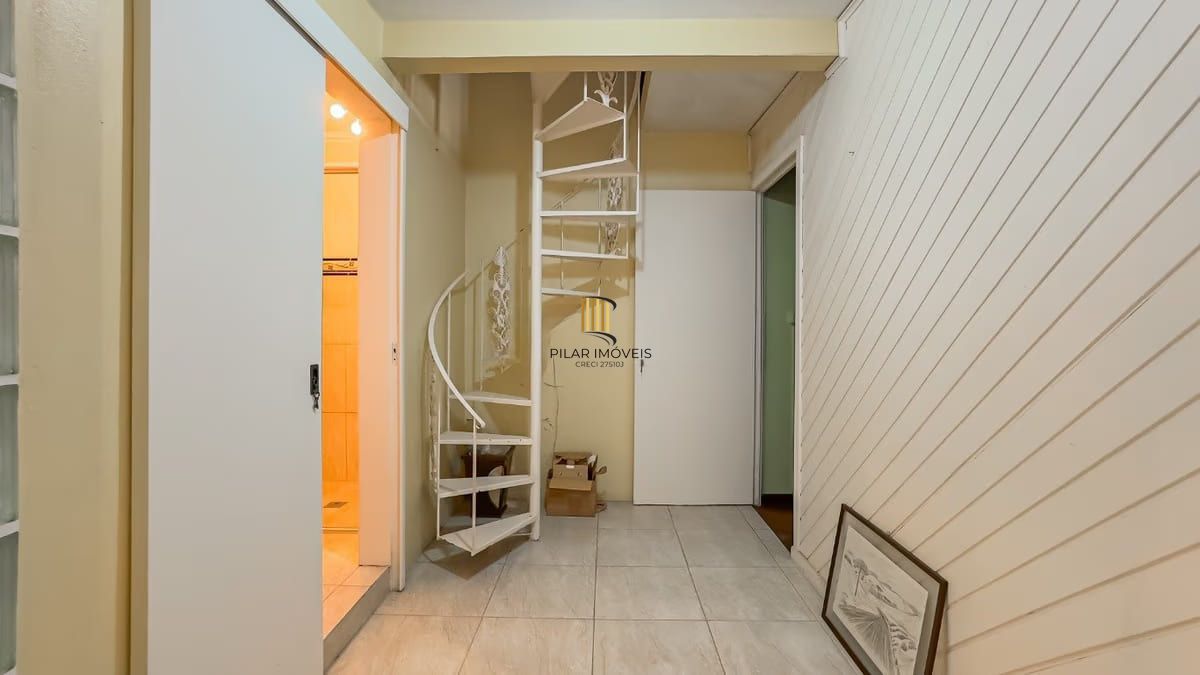 Sobrado de 3 dormitórios e 91m² à venda em Parque Santa Fé, Porto Alegre.