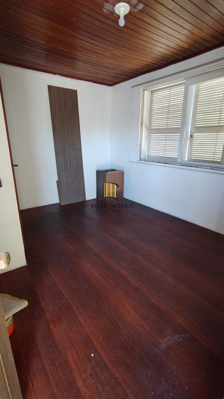 Casa de 3 dormitórios no bairro à venda em Vila Nova, Porto Alegre