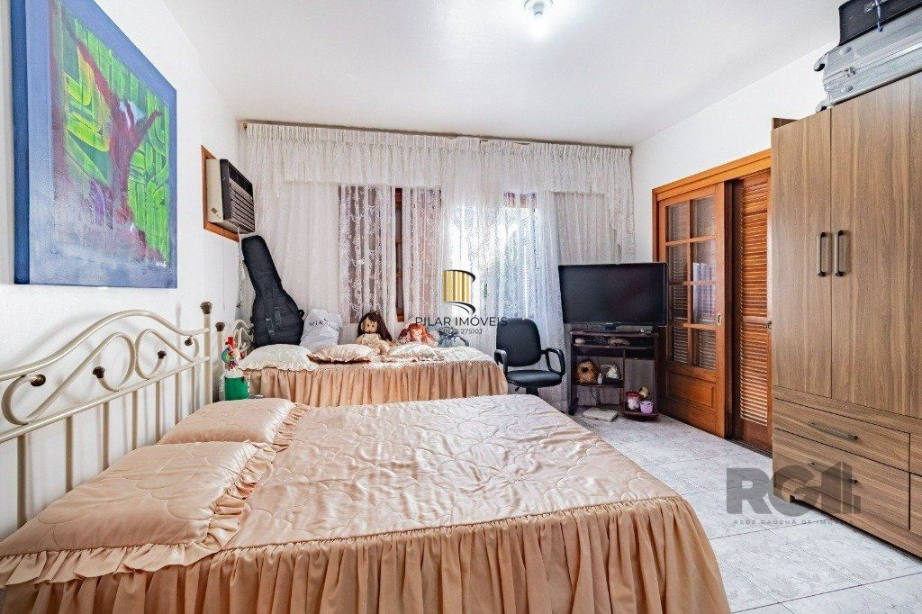 Casa com 267m², 3 dormitórios, 1 vaga no bairro Tristeza