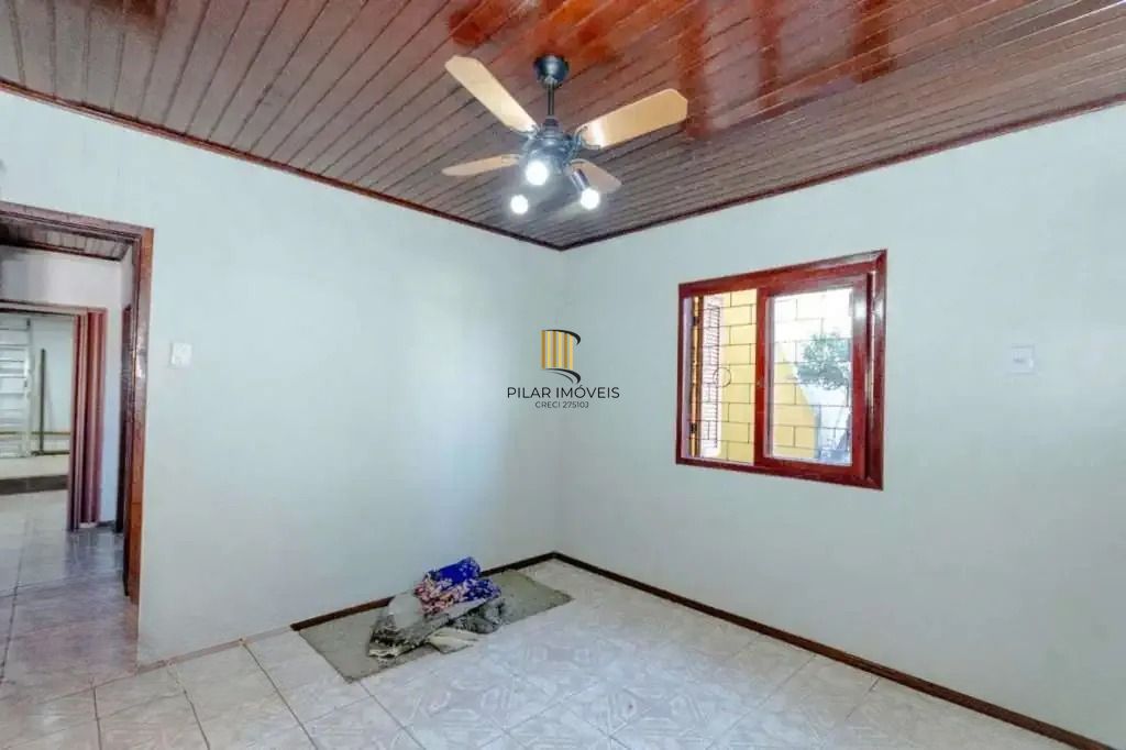 Casa à venda com 3 dormitórios, 1 suíte e espaço gourmet em terreno alto