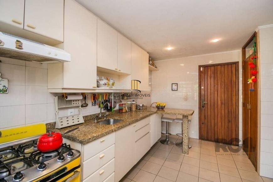 Casa 279m² - 4 dormitórios, 3 vagas no bairro Santa Tereza