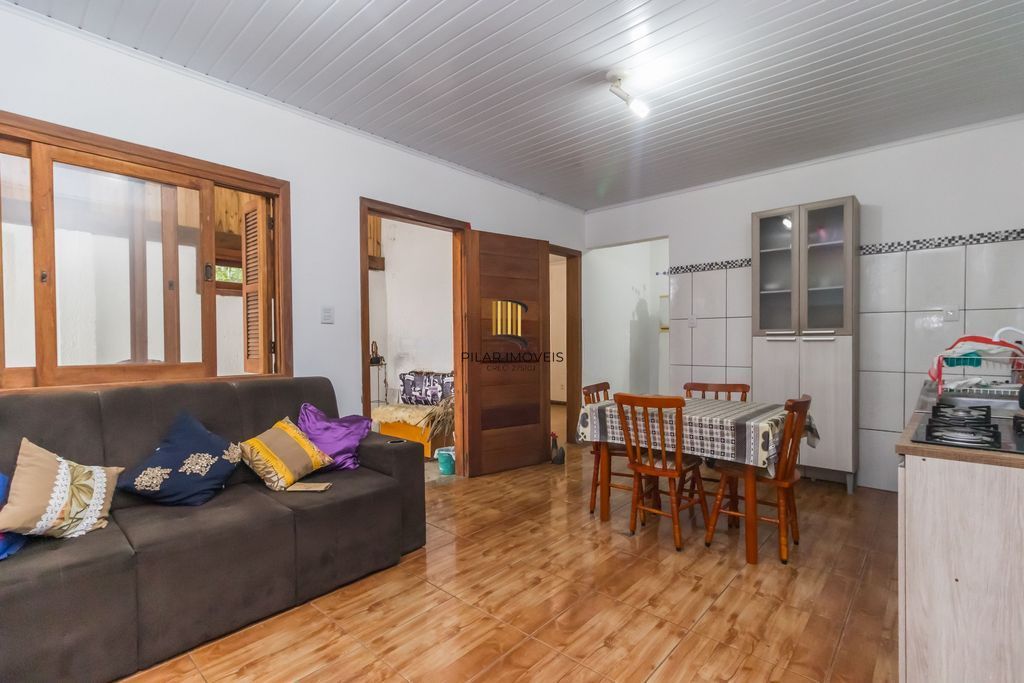 Casa de 6 dormitórios à venda Bairro Vila Nova - Porto Alegre