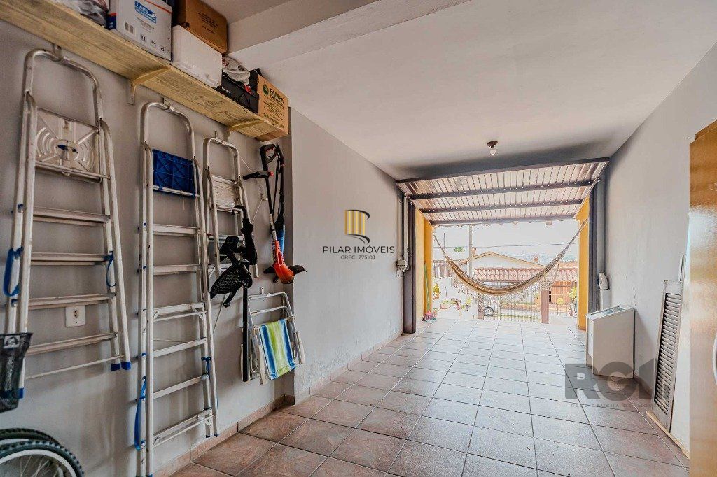 Casa com 234m², 3 dormitórios, 3 vagas no bairro Partenon
