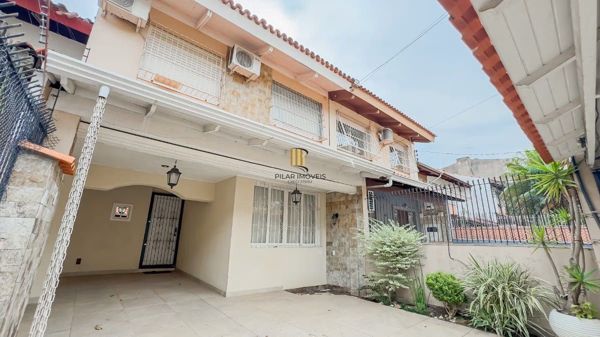 Sobrado de 3 dormitórios e 91m² à venda em Parque Santa Fé, Porto Alegre.