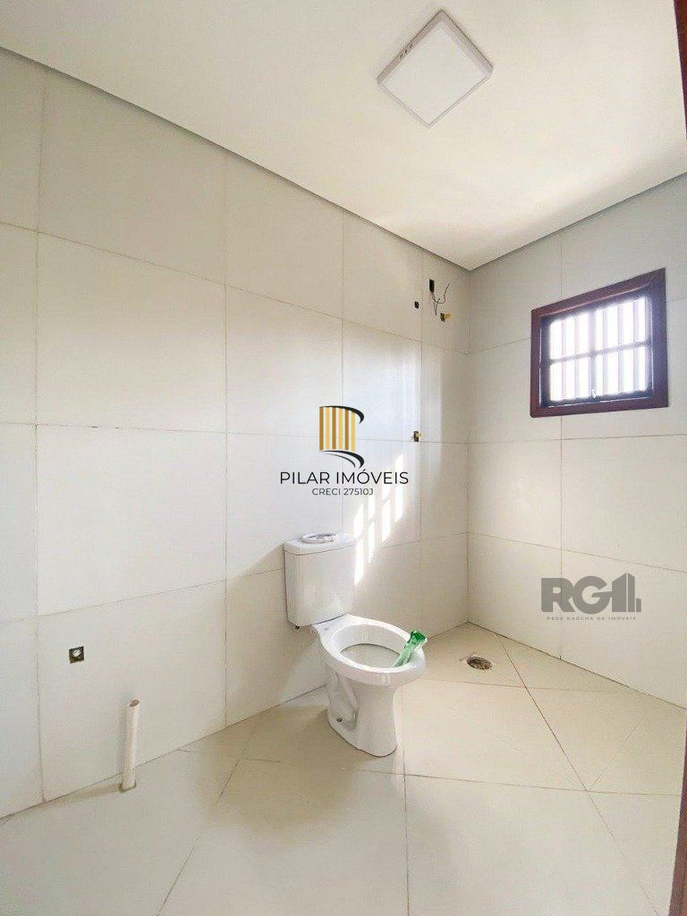 Casa de 3 dormitórios no bairro Mário Quintana