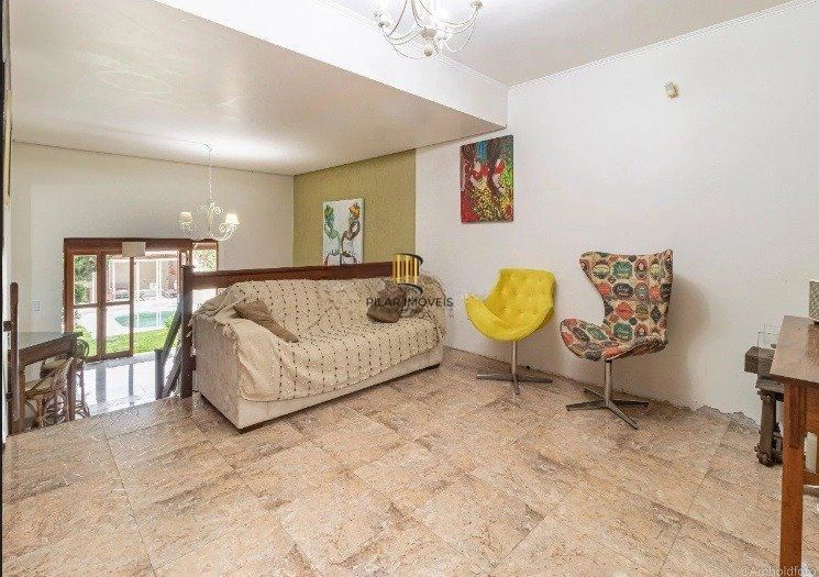 Casa de 3 dormitórios à venda em Ipanema, Porto Alegre.