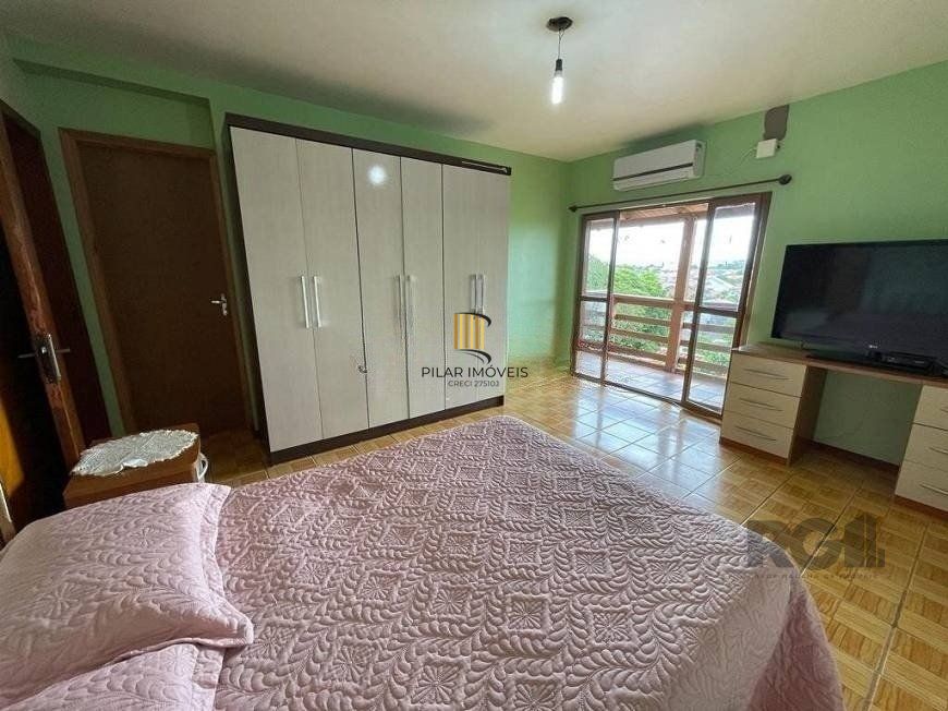 Casa de 4 dormitórios, bairro Ipanema