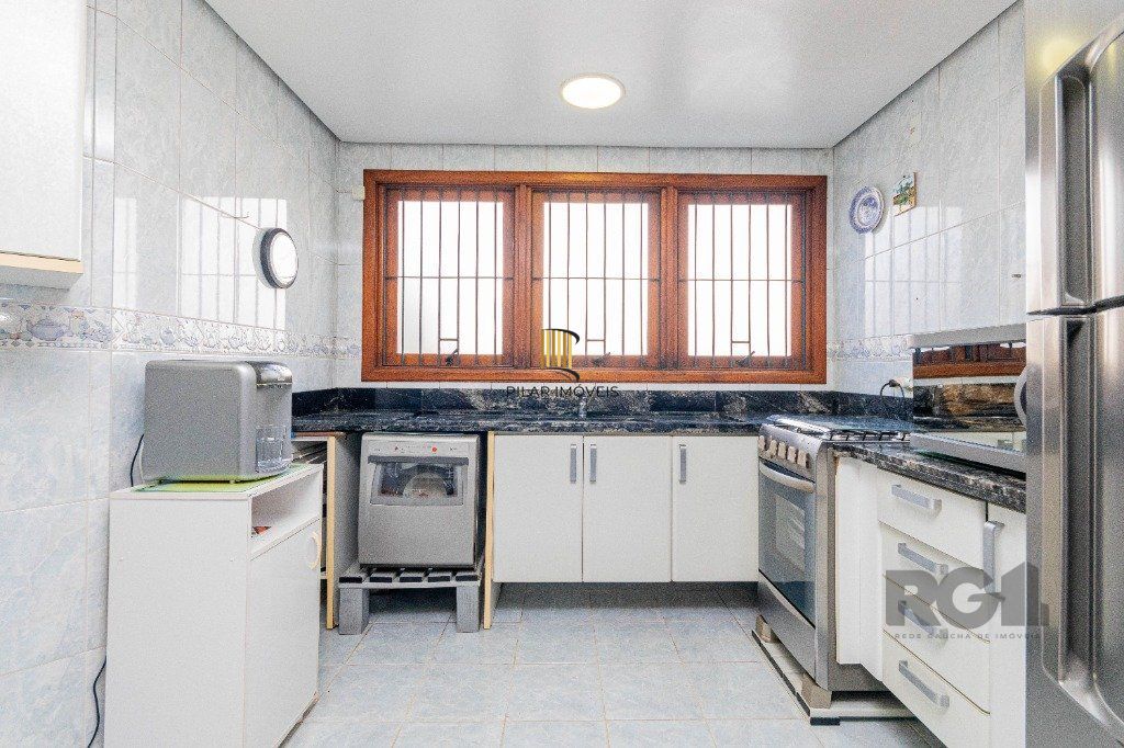 Casa de 4 dormitórios 304m² no bairro Jardim Lindóia