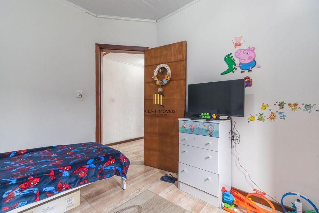 Casa de 6 dormitórios à venda Bairro Vila Nova - Porto Alegre