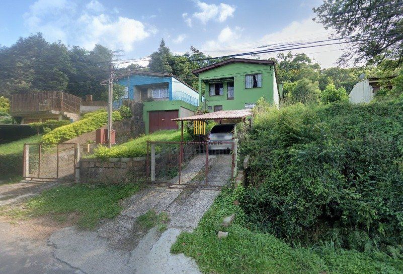 Casa 280m² - 5 dormitórios, 4 banheiros, 2 vagas no bairro Cascata