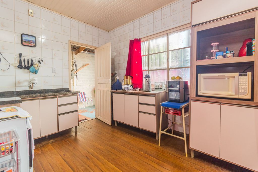 Casa 2 dormitórios à venda no Bairro Santa Rosa de Lima