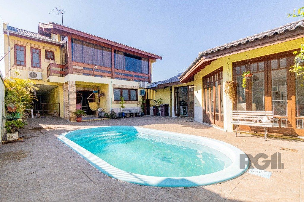 Casa de 4 dormitórios 304m² no bairro Jardim Lindóia