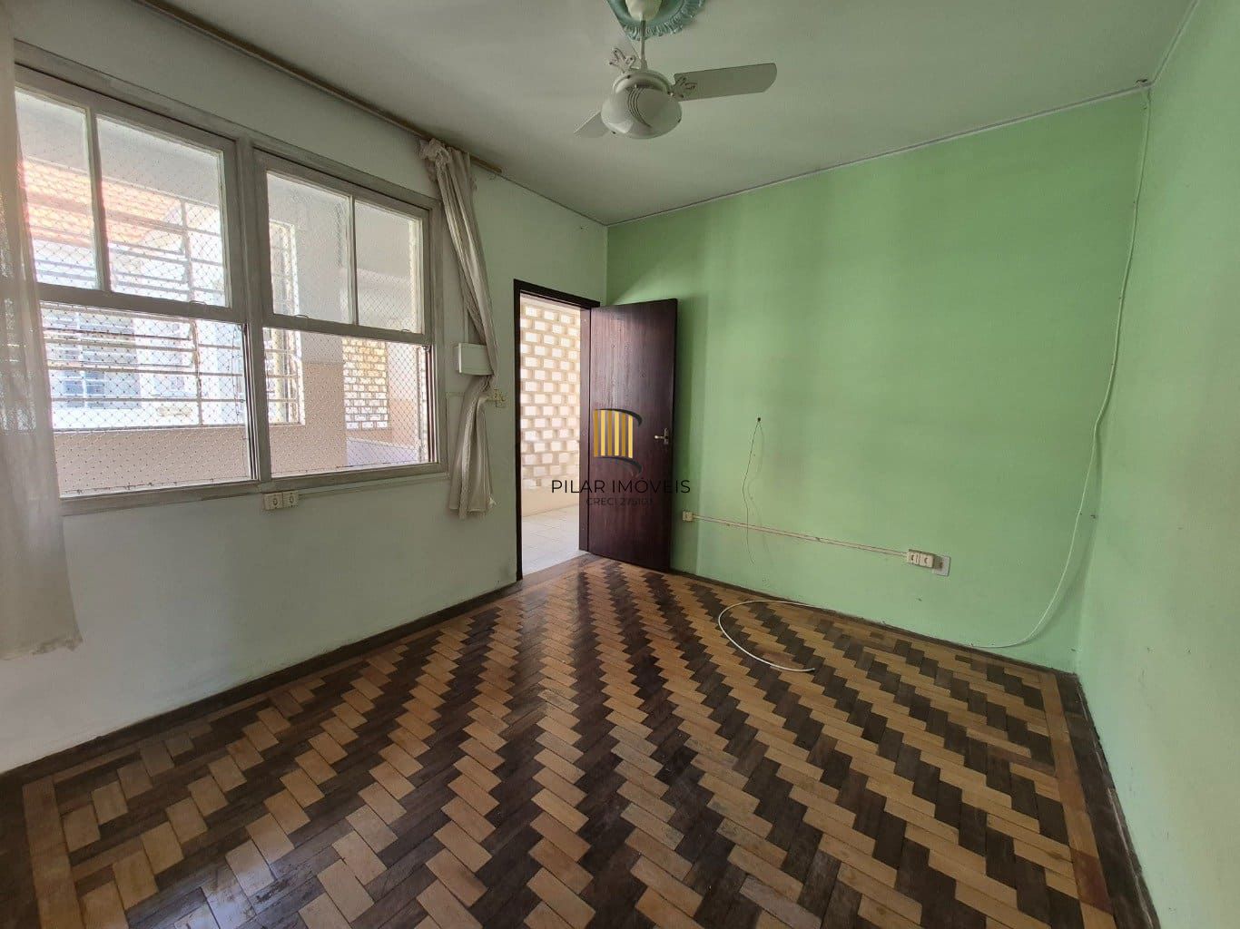 Apartamento de 1 dormitório à venda em Menino Deus, Porto Alegre.