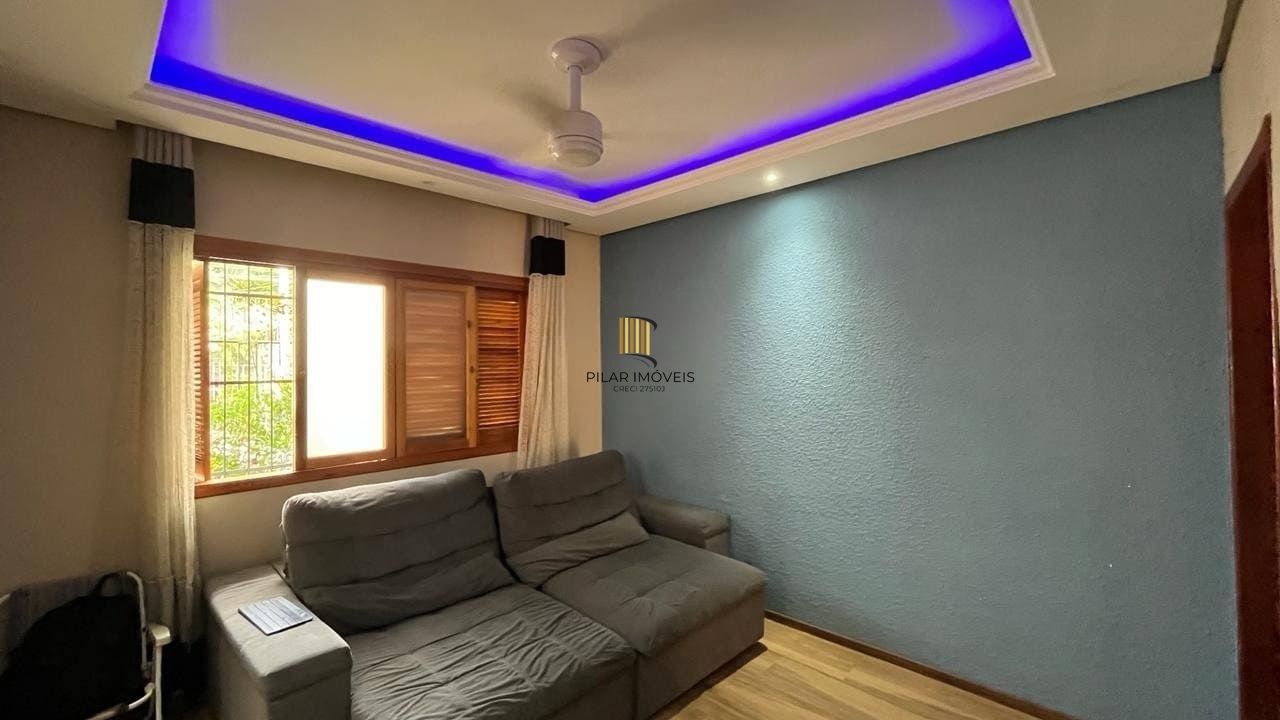 Casa de 4 dormitórios no bairro Santo Antônio, Porto Alegre