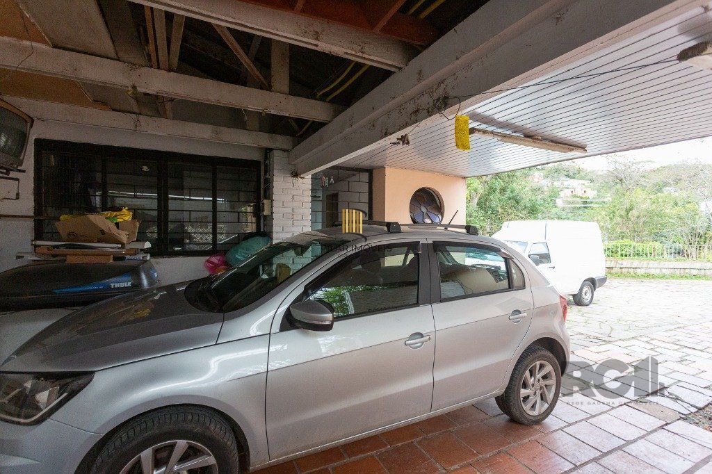 casa de 4 dormitórios no bairro cavalhada