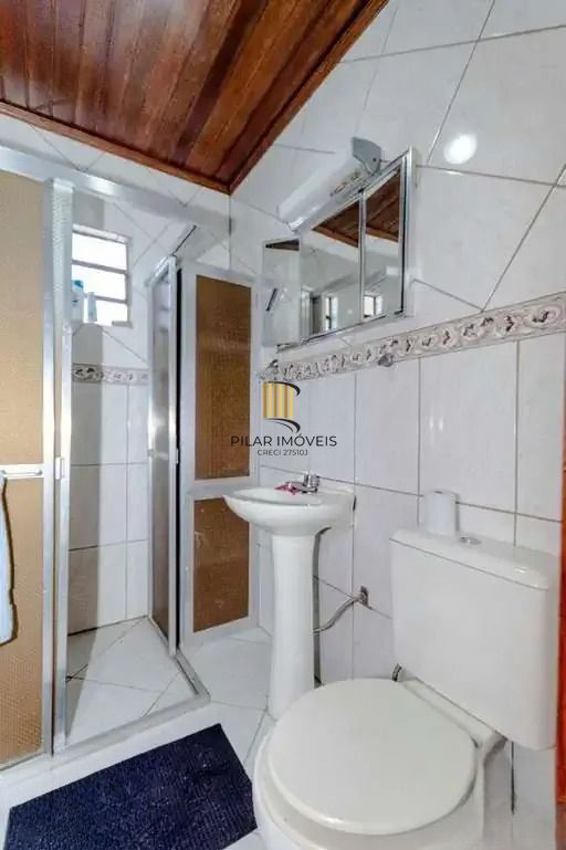 Casa à venda com 3 dormitórios, 1 suíte e espaço gourmet em terreno alto