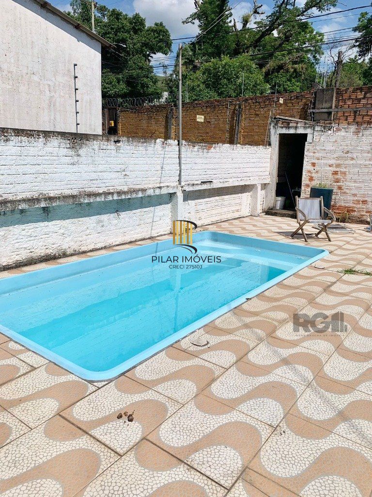 Casa 3 dormitórios no bairro Glória