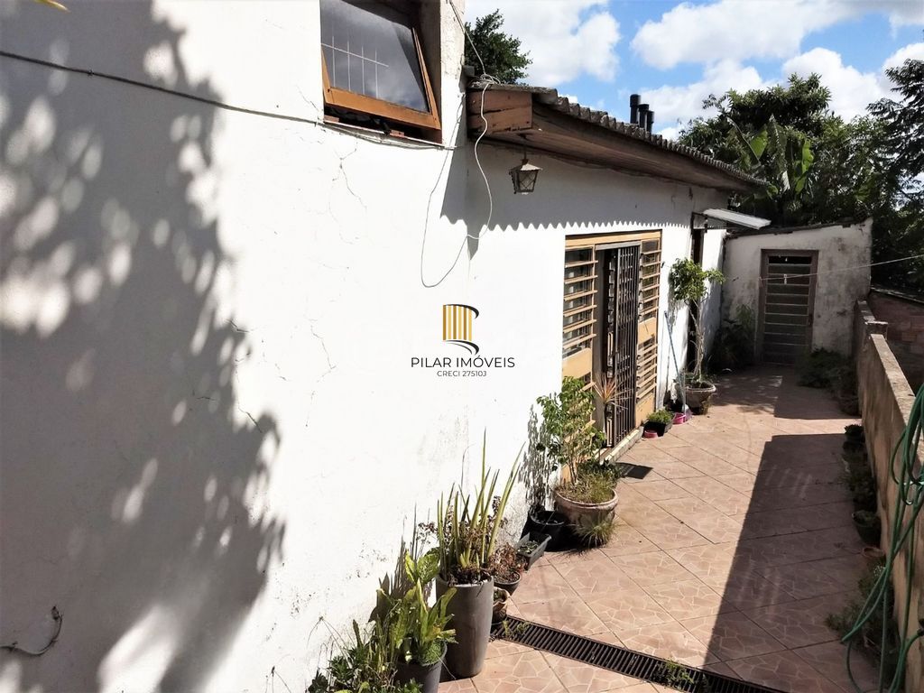 Casa 4 dormitórios à venda no Bairro Vila Jardim - Porto Alegre